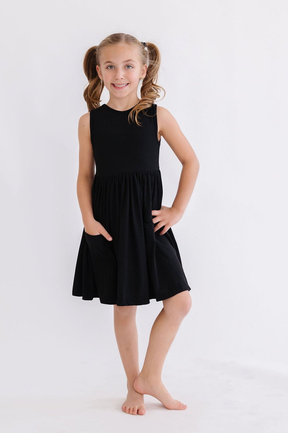 a girl in a black dress