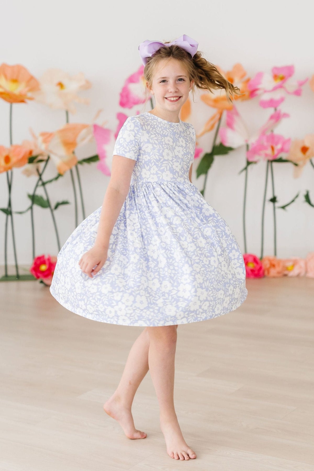a girl in a dress