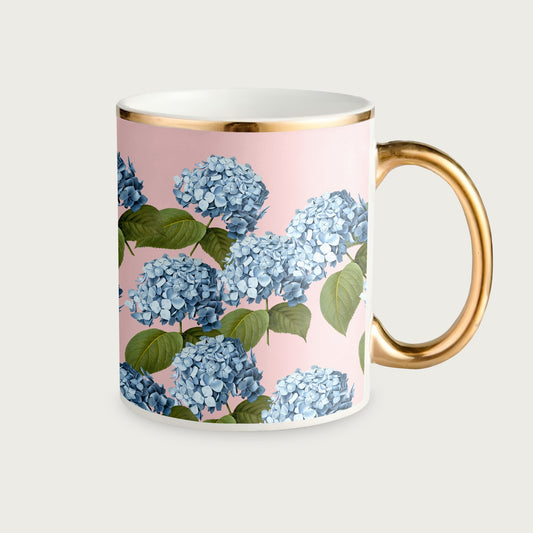 a coffee mug with flowers on it