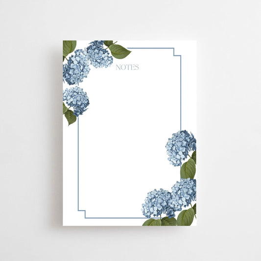 a notepad with flowers on it