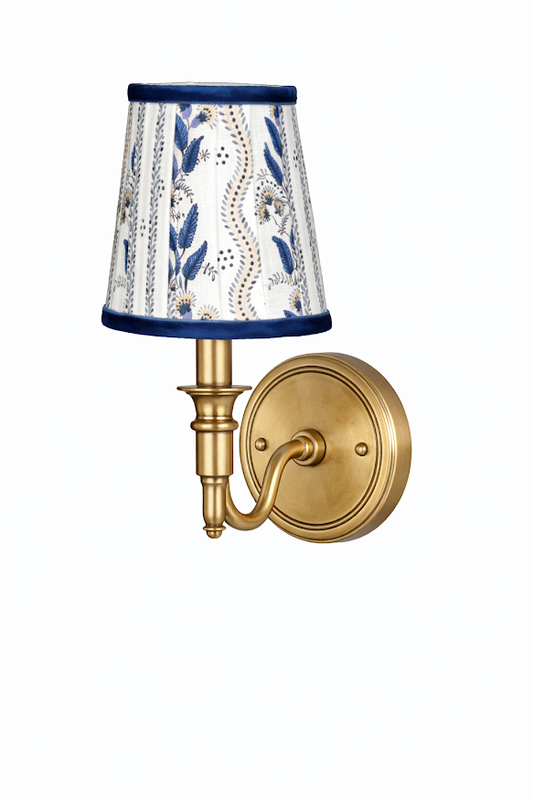 a light fixture with a white and blue shade