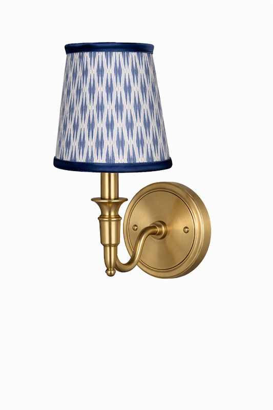 a light fixture with a blue and white shade