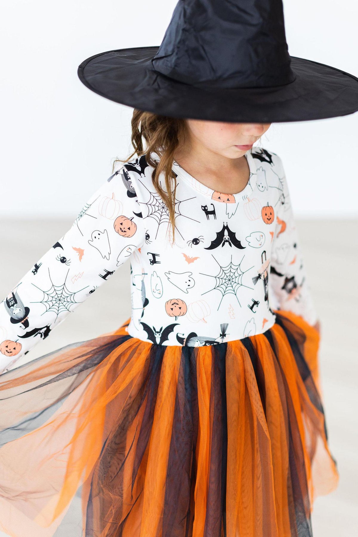 a girl wearing a person hat