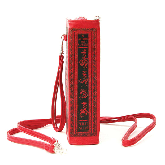 a red book case with a strap