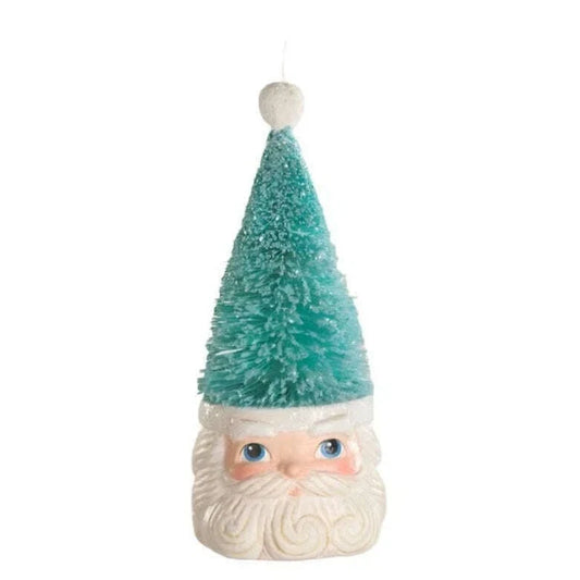 a small santa claus head with a small cone hat
