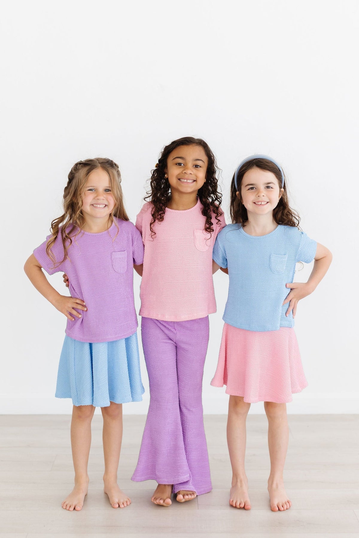 a group of girls posing for a picture