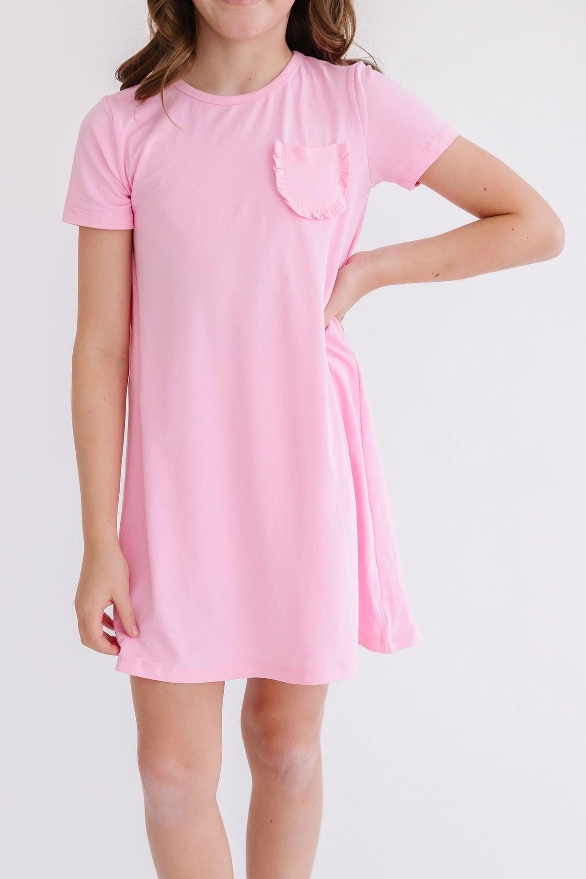 a woman in a pink dress