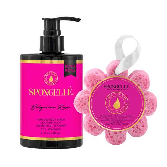 a bottle of soap and a pink flower