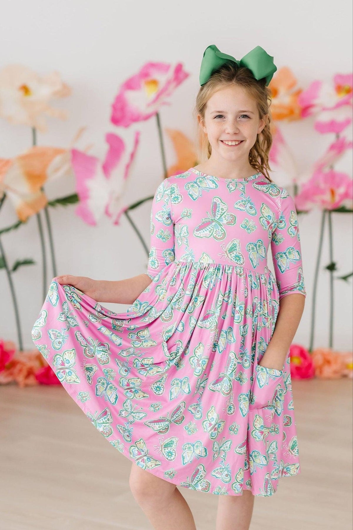 a girl in a pink dress