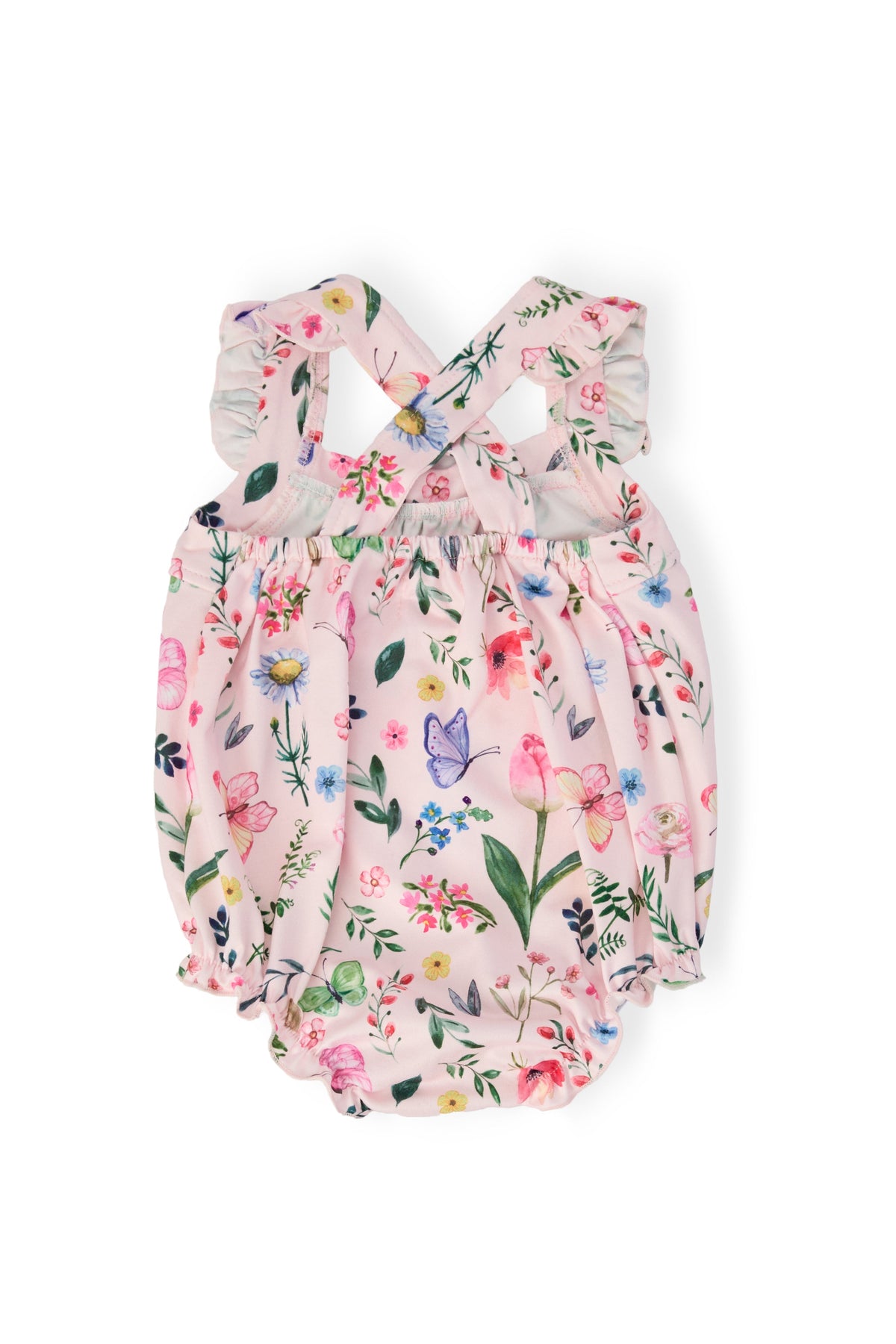a pink romper with floral design