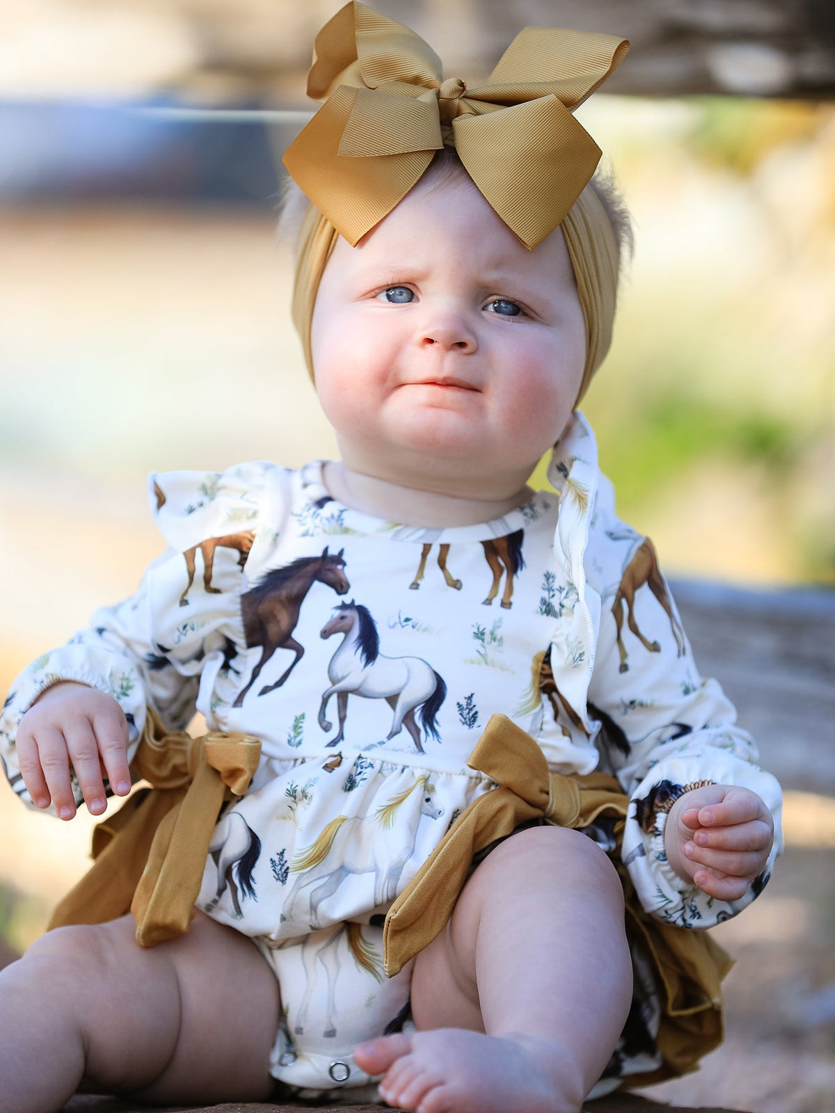 a baby wearing a bow