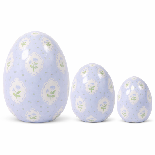 a group of eggs with floral designs
