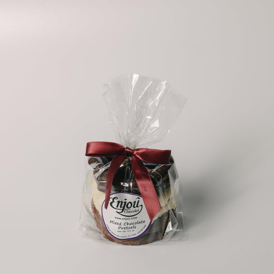 a bag of chocolates with a red bow
