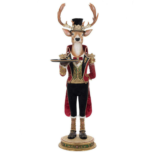 a statue of a deer holding a tray