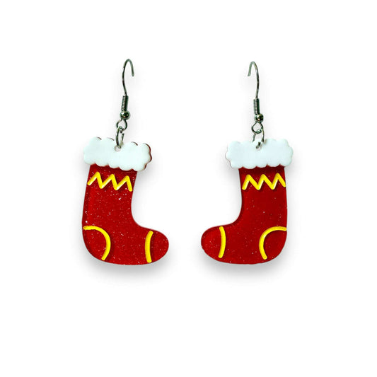 a pair of red and yellow earrings