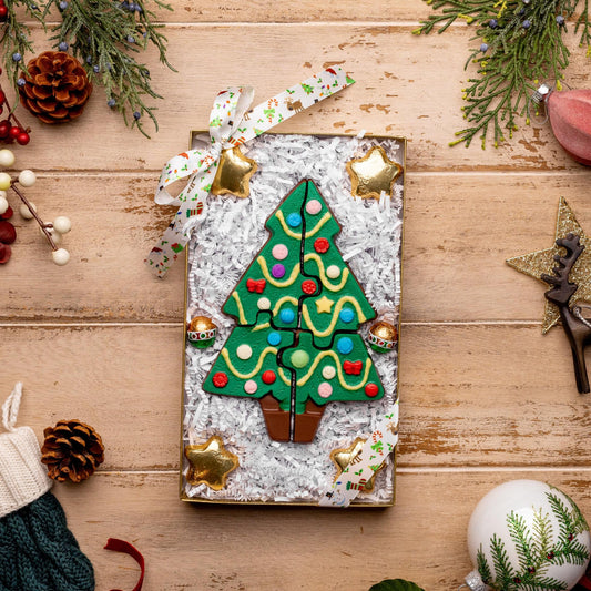 a decorated box with a christmas tree on it