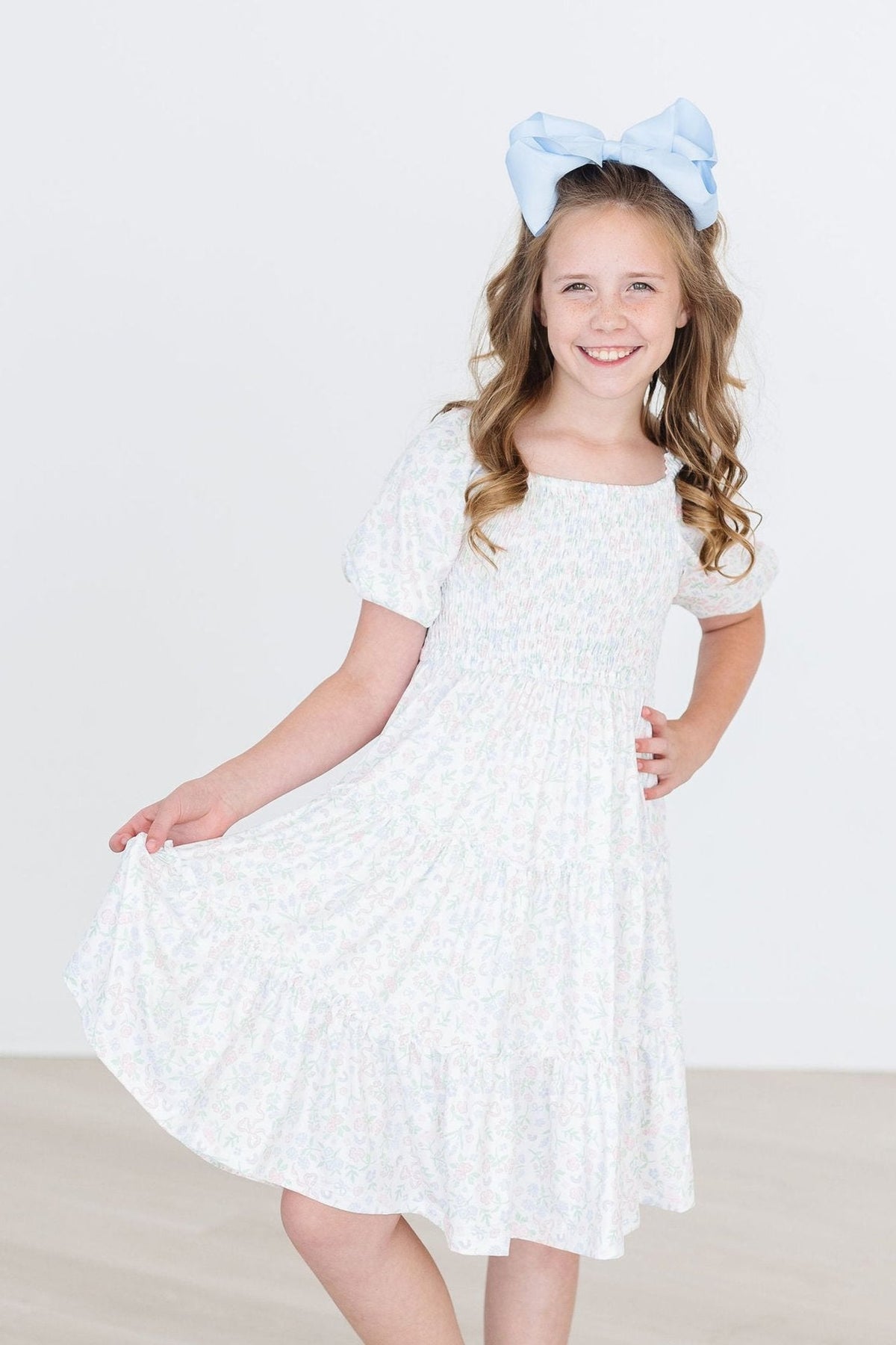 a girl in a white dress