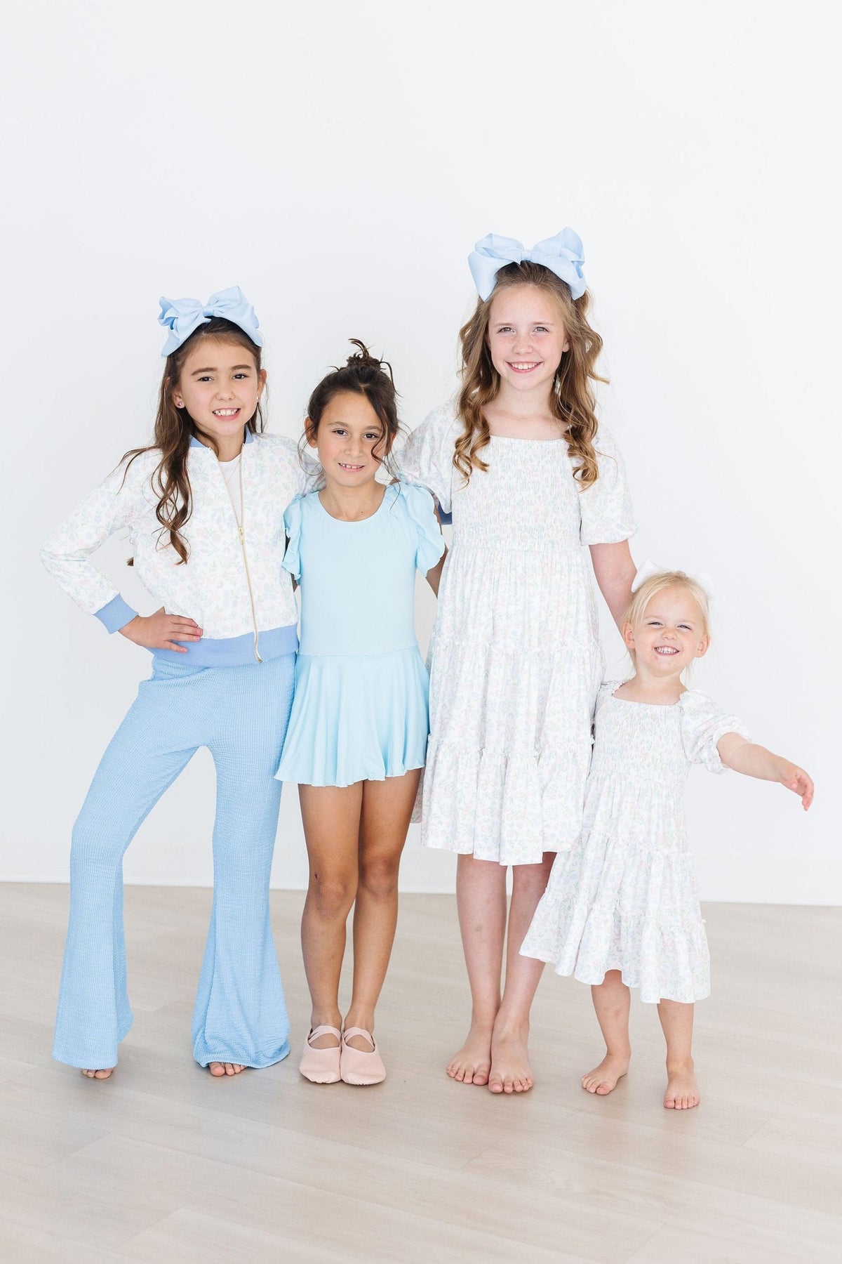 a group of girls posing for a picture
