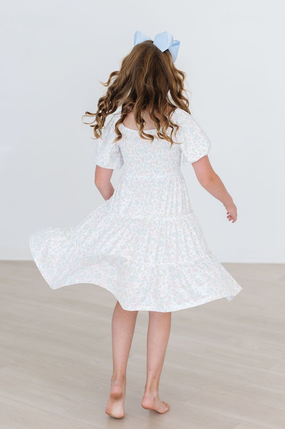 a girl in a white dress