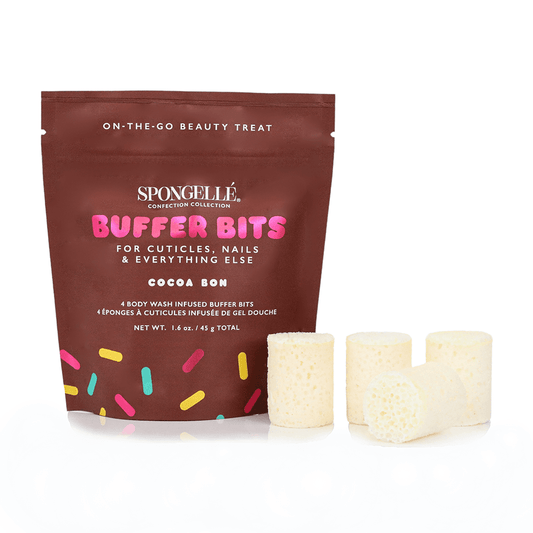 a brown bag with white and pink sprinkles next to white objects