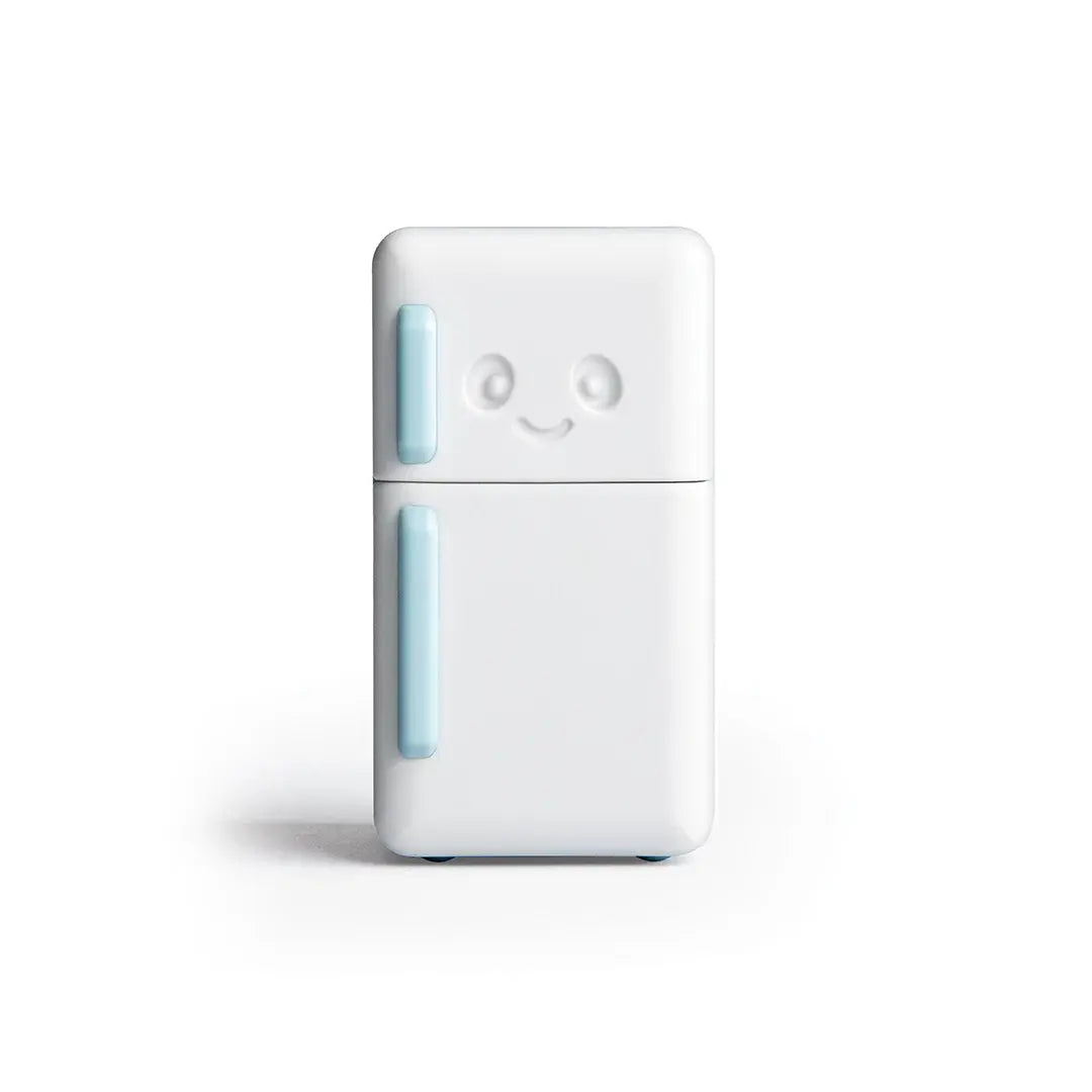 a small white refrigerator with a face on it