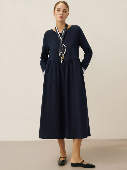 a woman in a long dress