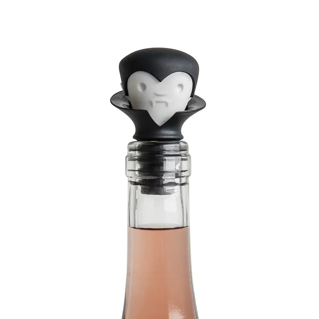 a bottle with a penguin head on top