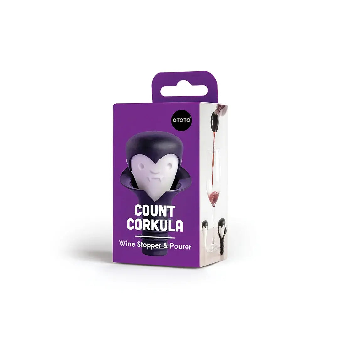 a purple box with a white and black object with a black object on it