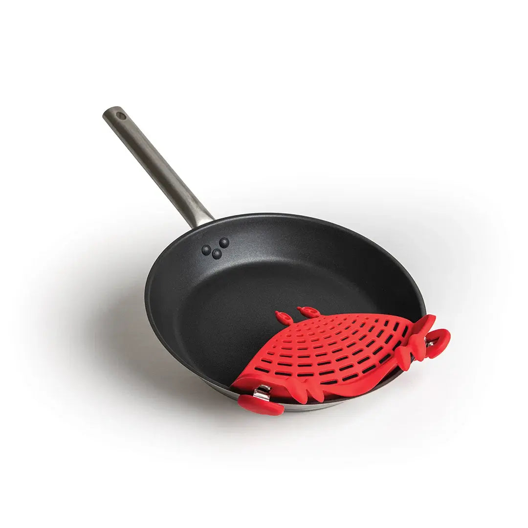 a pan with a red silicone holder