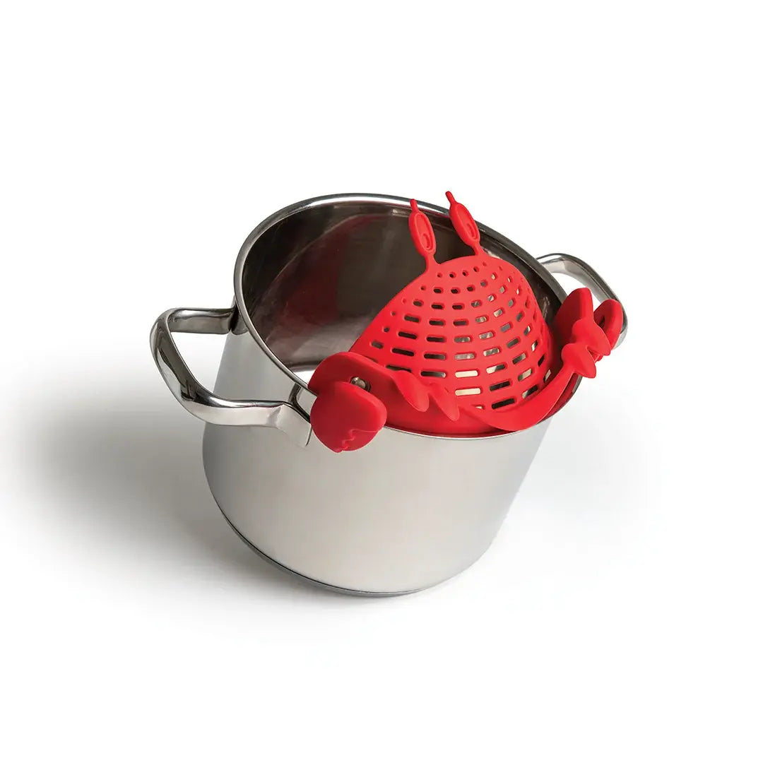 a pot with a crab strainer