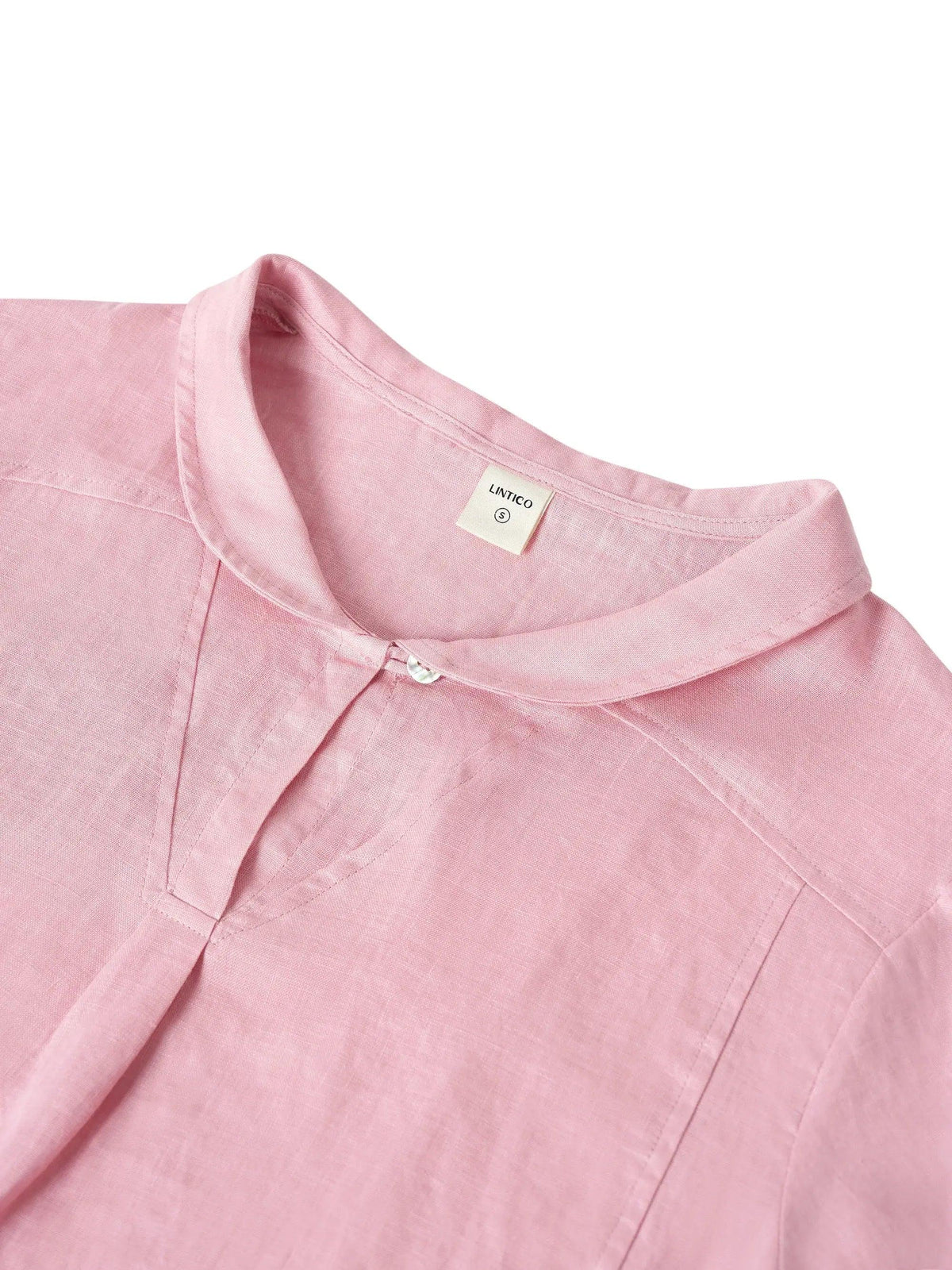 a close up of a pink shirt