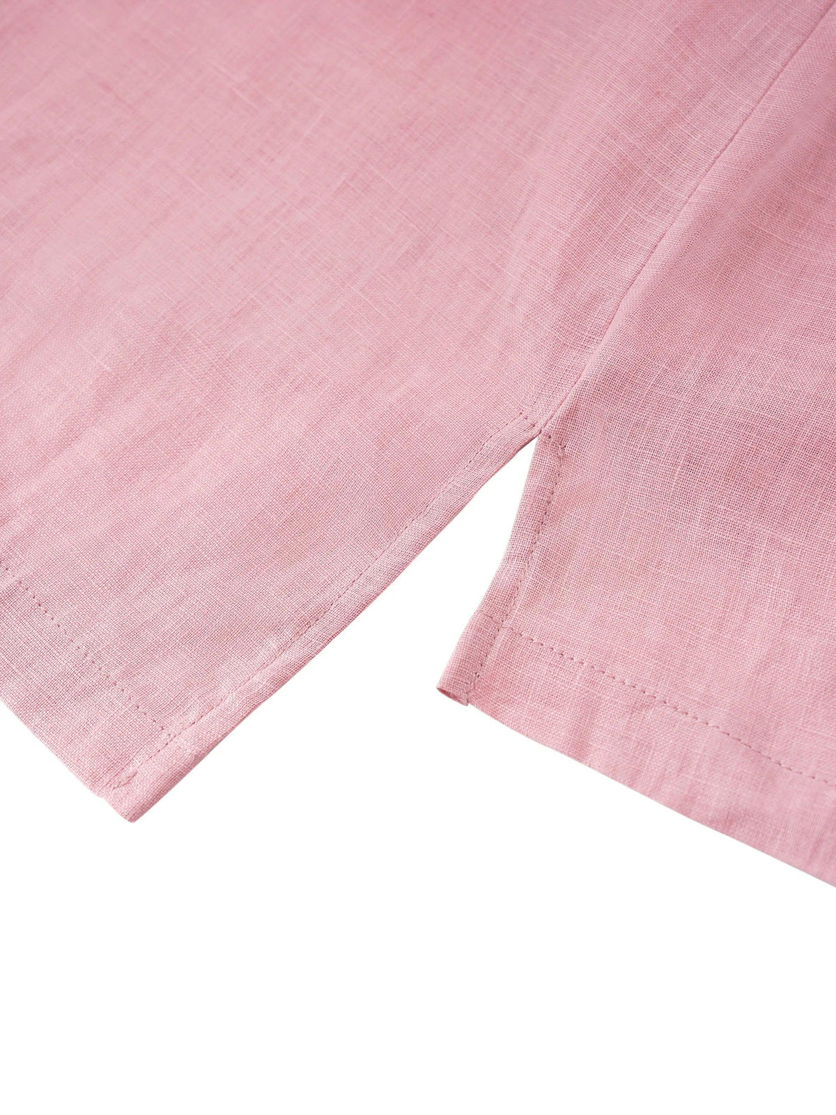 a pink cloth with a white background