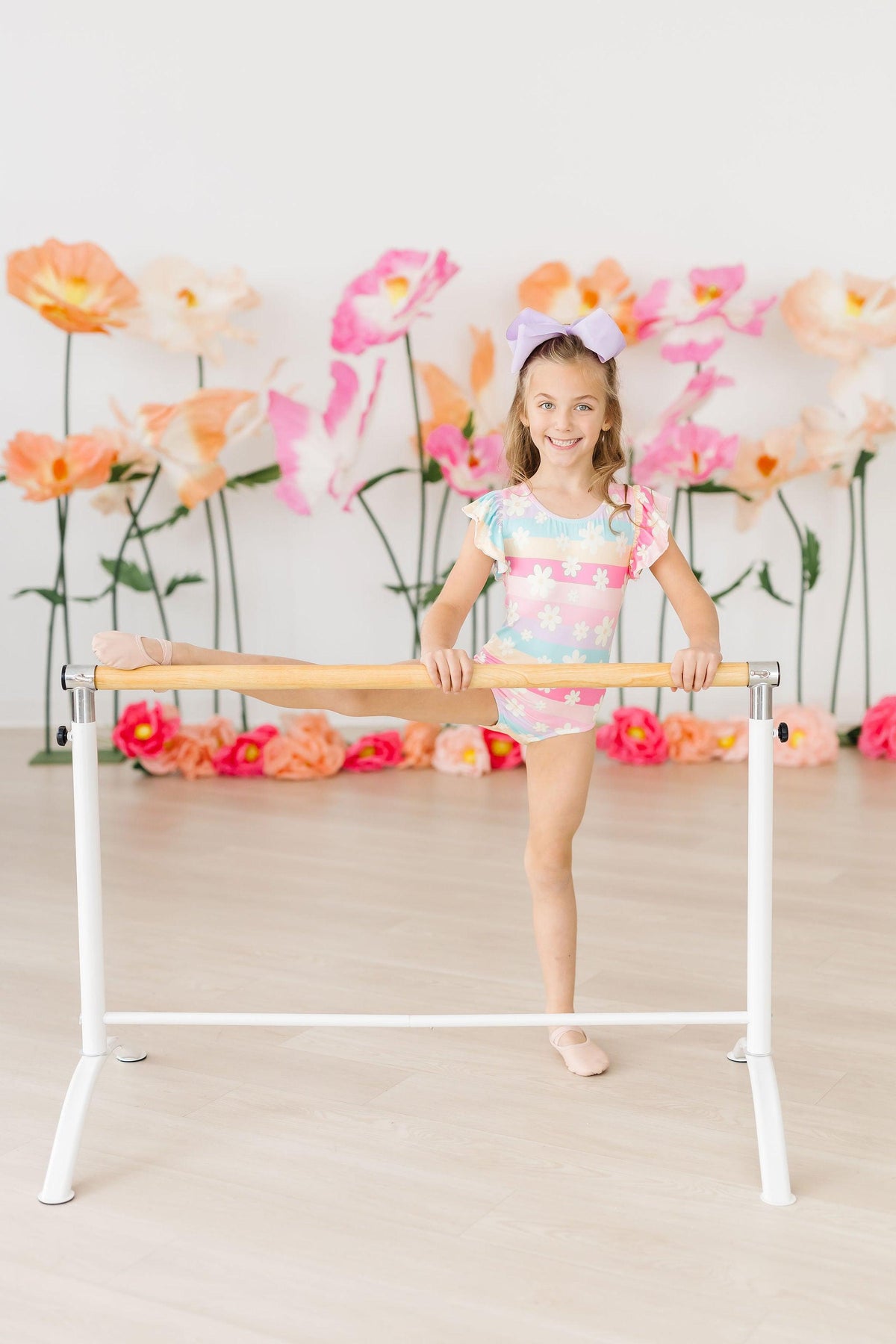 a girl standing on a bar