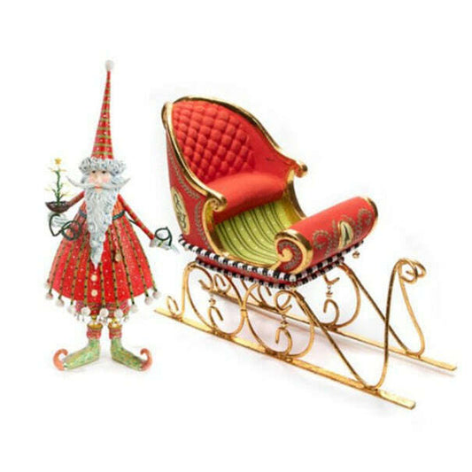 a toy gnome and a sleigh