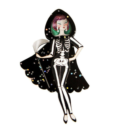 a paper doll in a skeleton garment