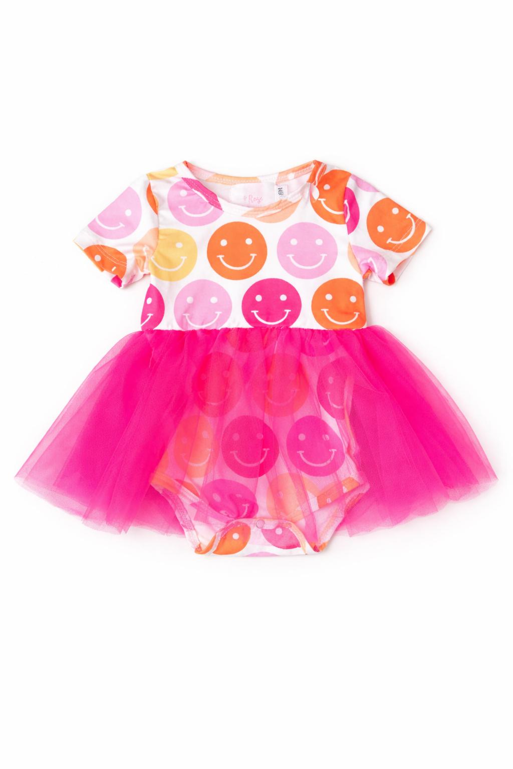 a baby girl dress with pink tutu