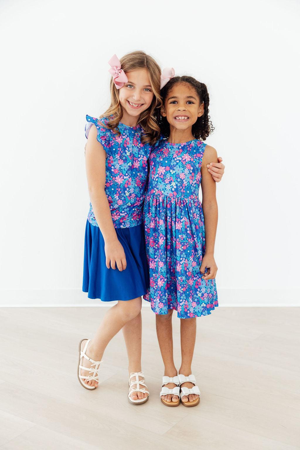 two girls posing for a picture