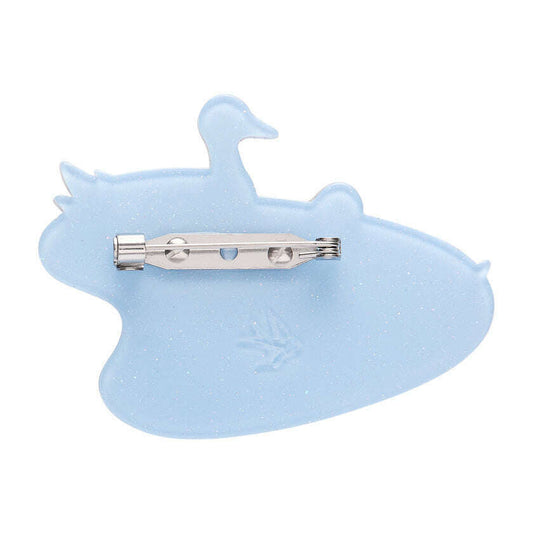 a blue plastic duck shaped brooch