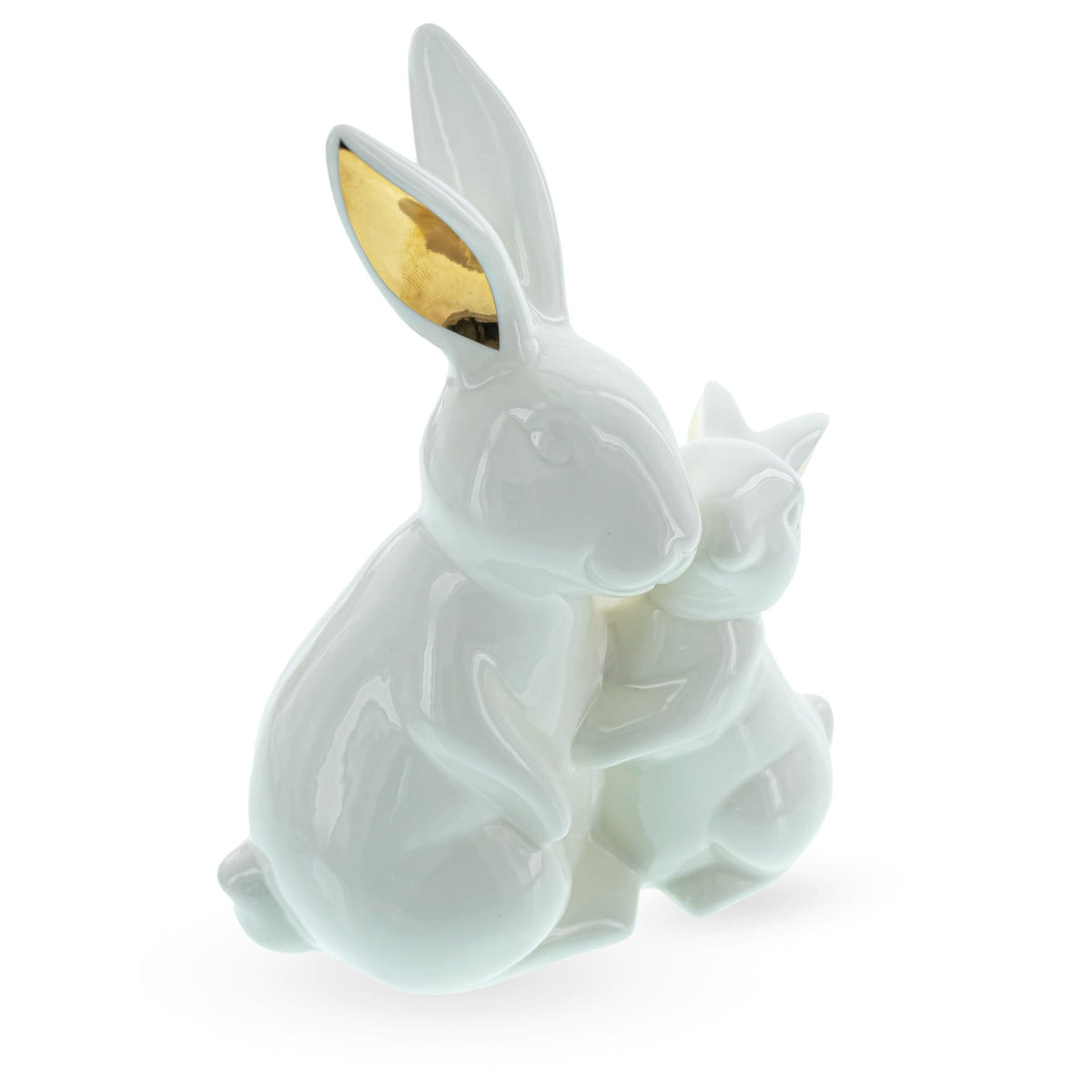 a white rabbit figurine with a cat