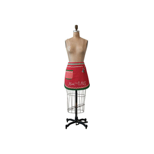 a mannequin wearing a red apron