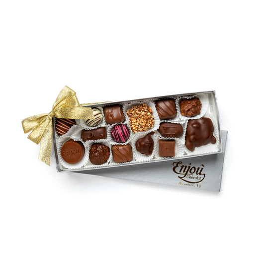 a box of chocolates with a bow