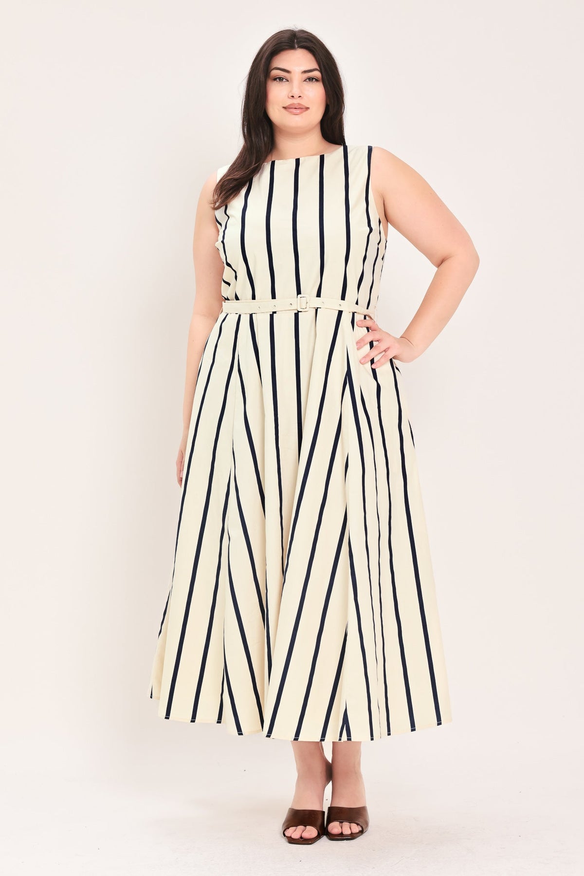a woman in a striped dress