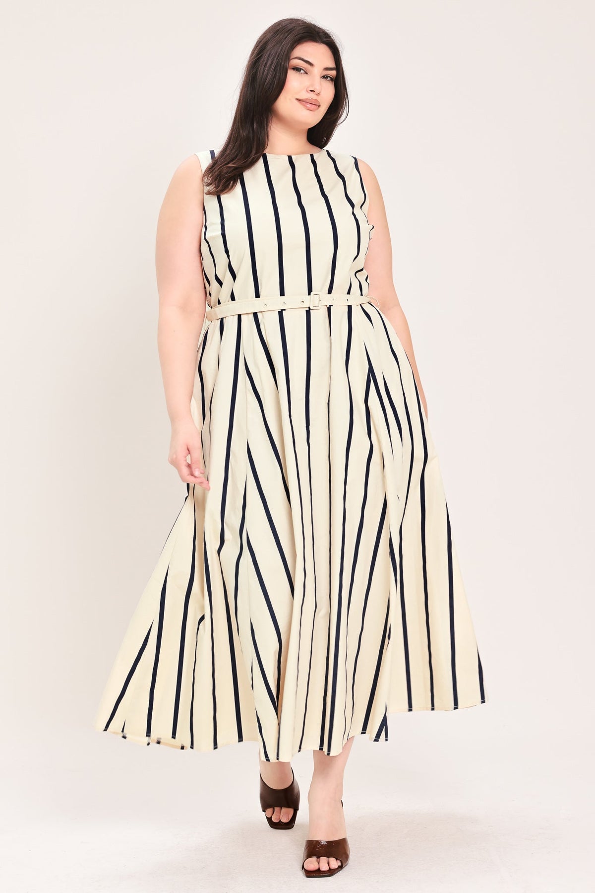 a woman in a striped dress