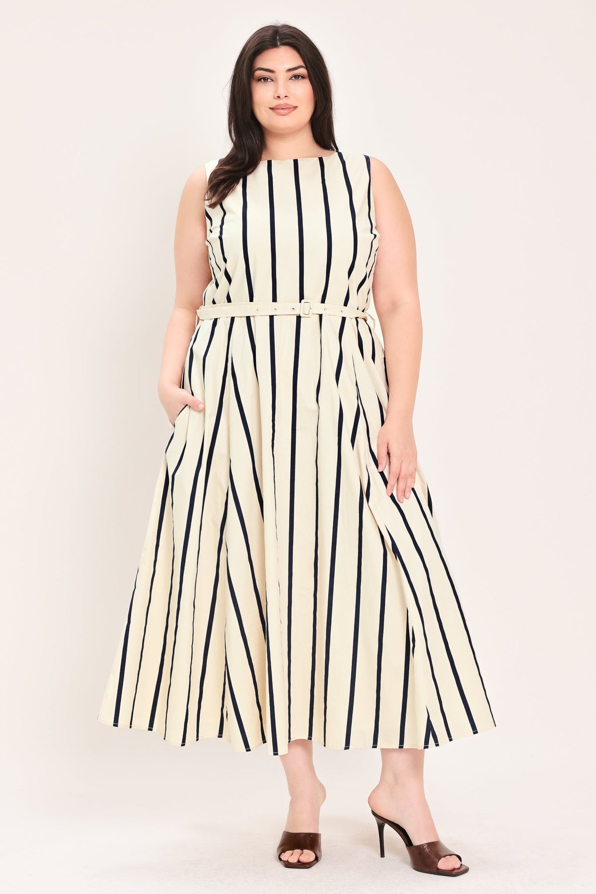 a woman in a striped dress