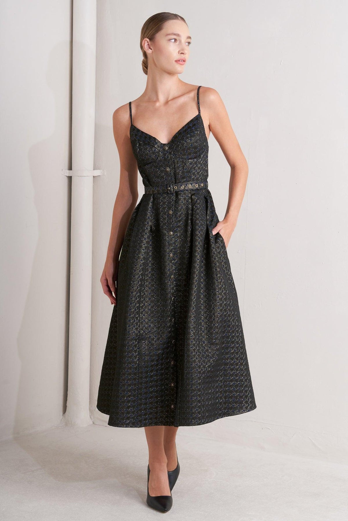 a woman in a black dress