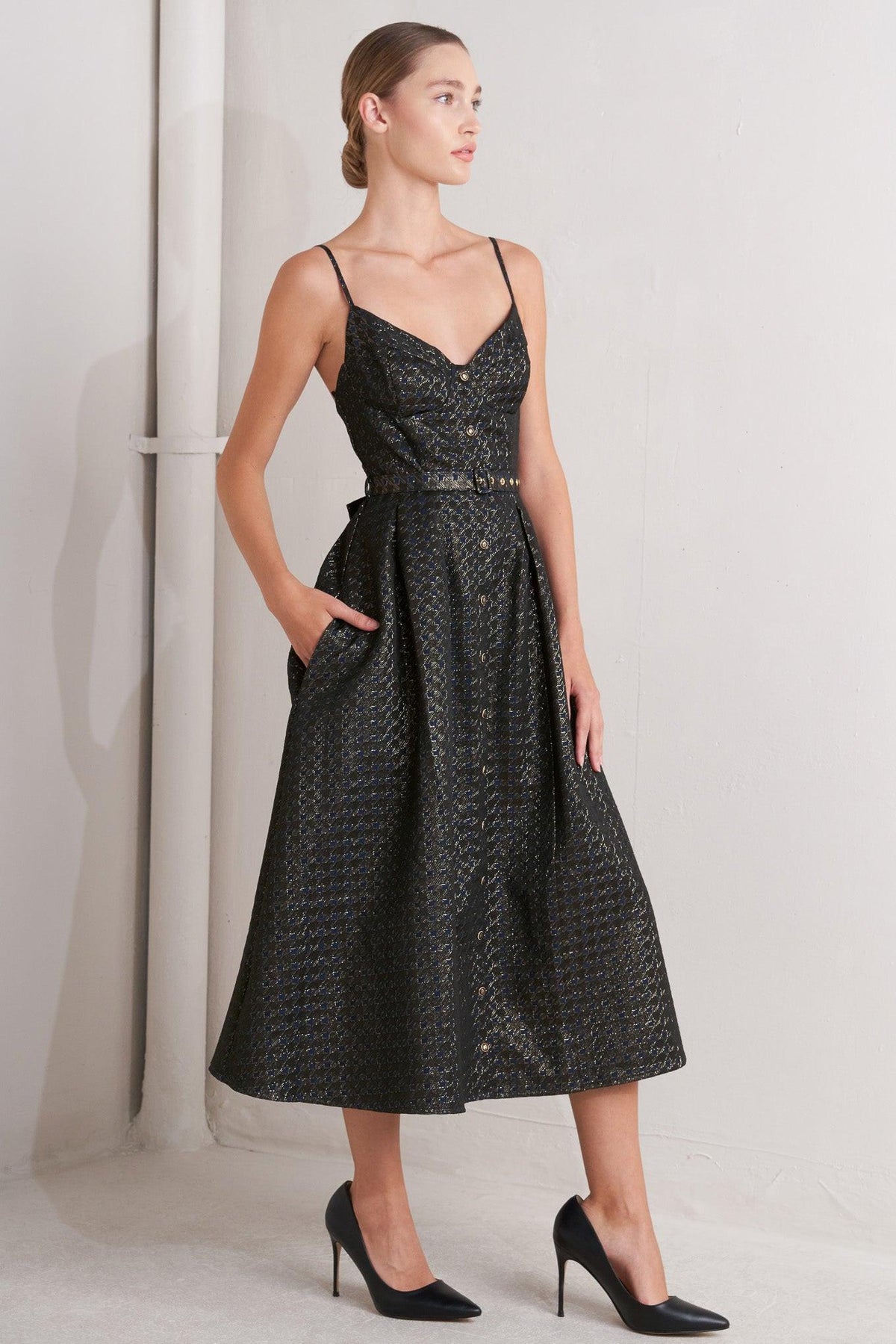 a woman in a black dress