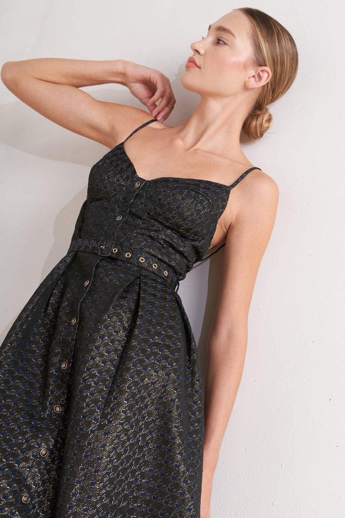 a woman in a black dress