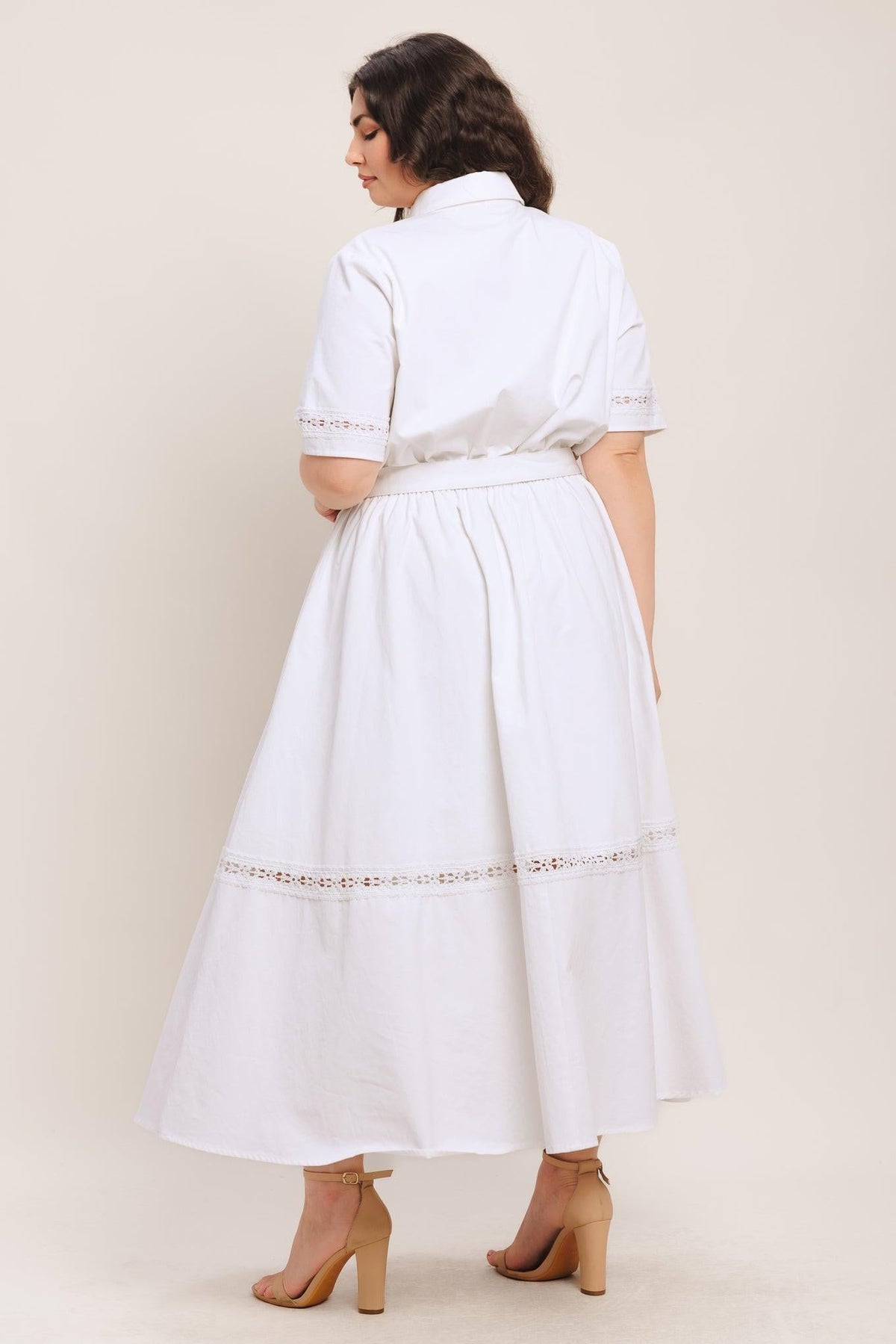 a woman in a white dress