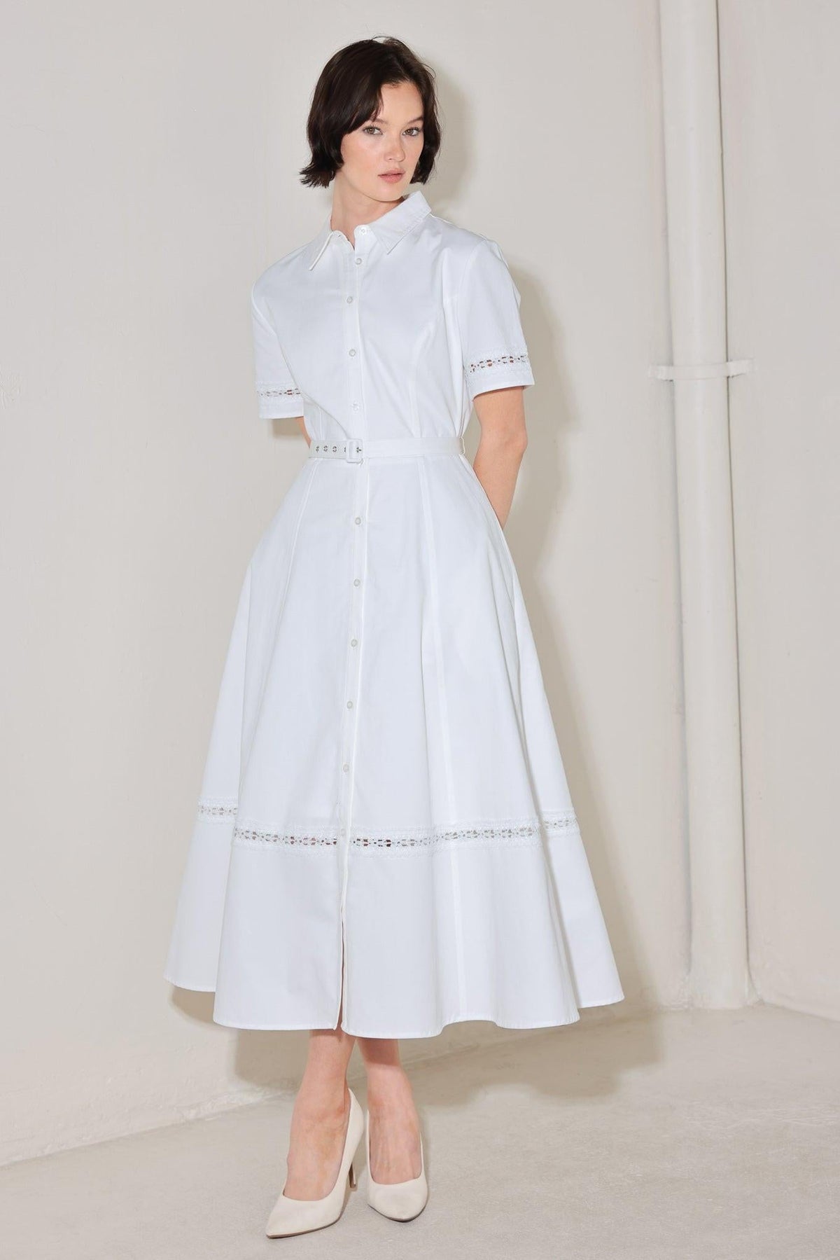a woman in a white dress