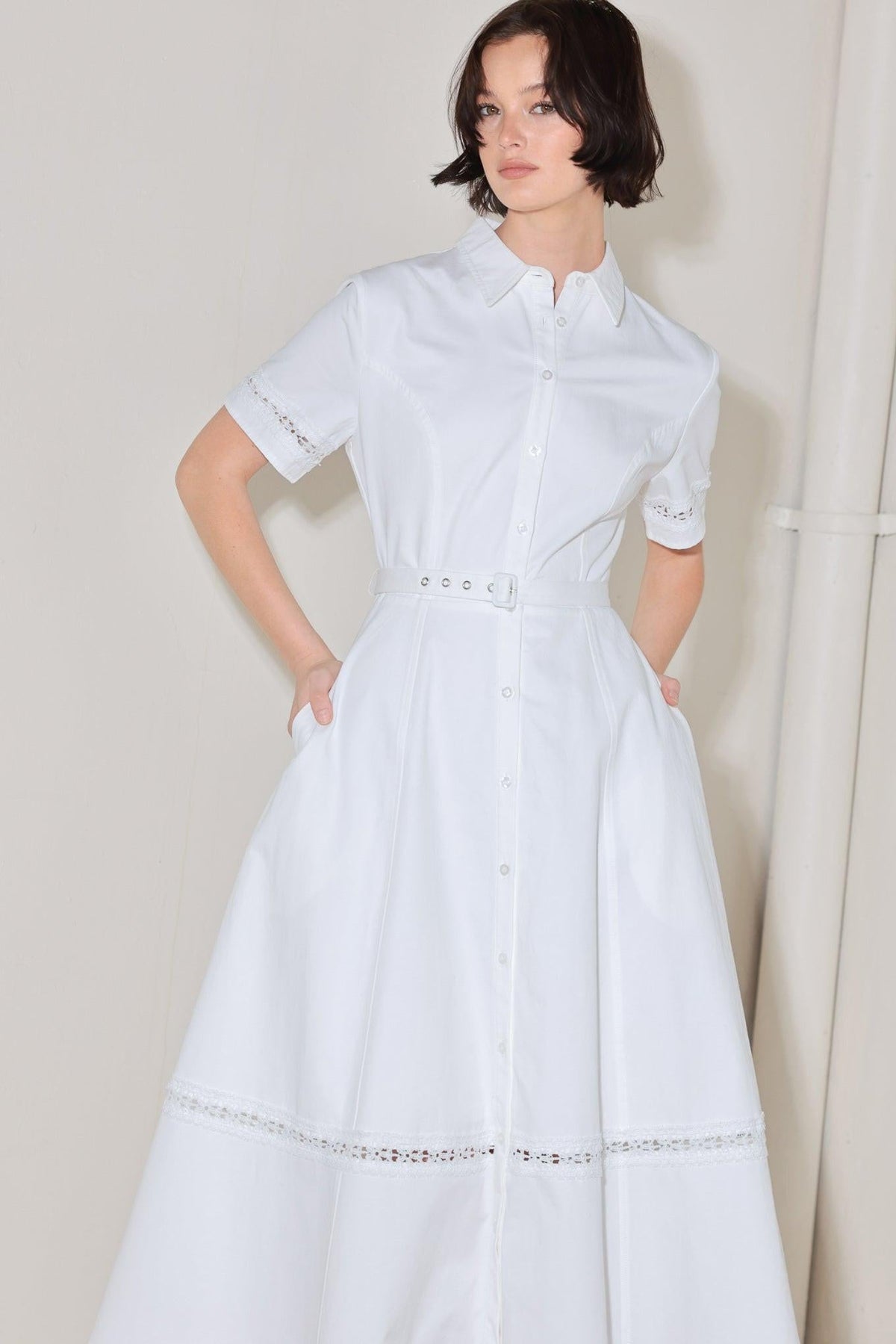 a woman in a white dress